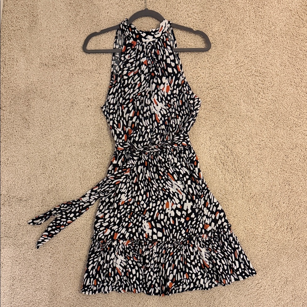 Elegant Black and White Mini Dress with Orange Accents